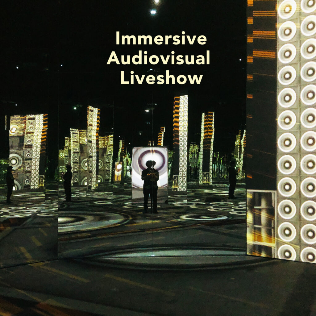 A man standing in an immersive visual hall