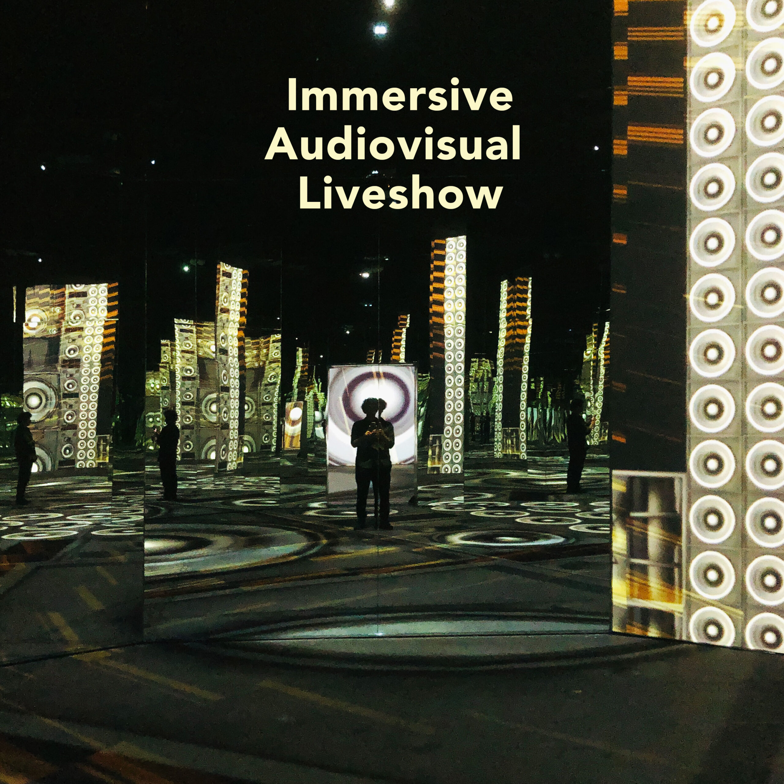 A man standing in an immersive visual hall